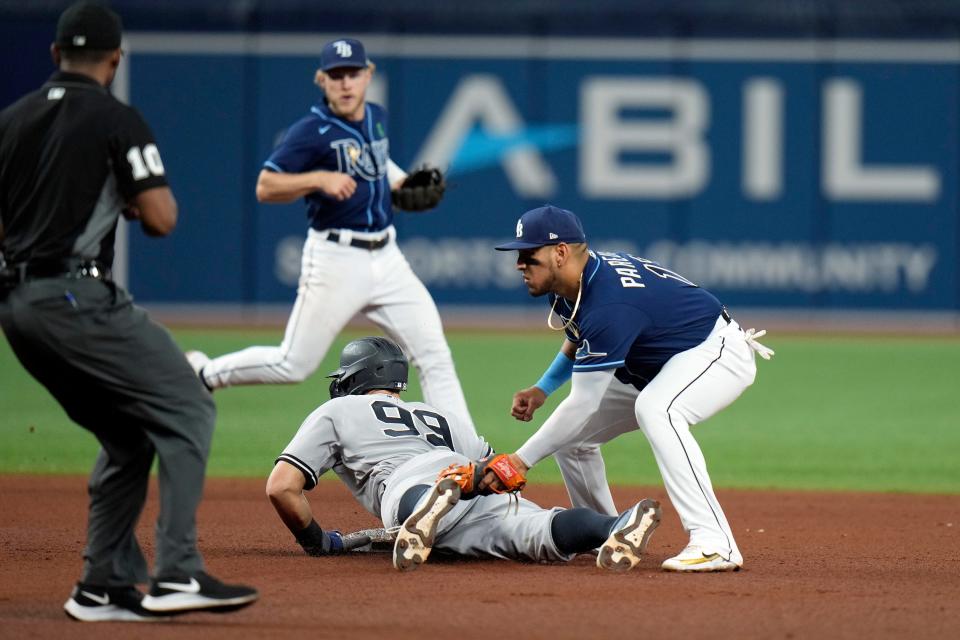 New York Yankees' Aaron Judge steals second base ahead of the tag by Tampa Bay Rays' Isaac Paredes during Game 1 of the teams' four-game series at Tropicana Fiend in St. Petersburg.