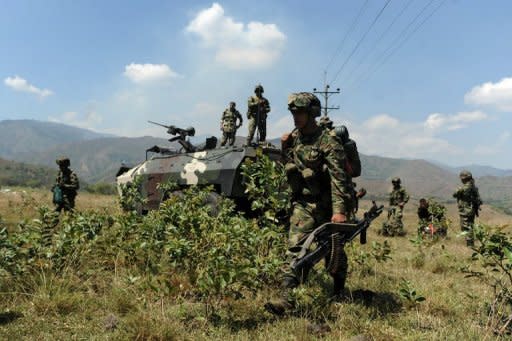 Colombian soldiers are seen before leaving for the mountains in Caloto, Cauca deparment, Colombia, in July 2012, during combat with the Revolutionary Armed Forces of Colombia (FARC) guerrillas. The FARC renounced the practice of kidnappings for ransom in February. The group released its last 10 military and police hostages in April, but is believed to still be holding dozens of civilians