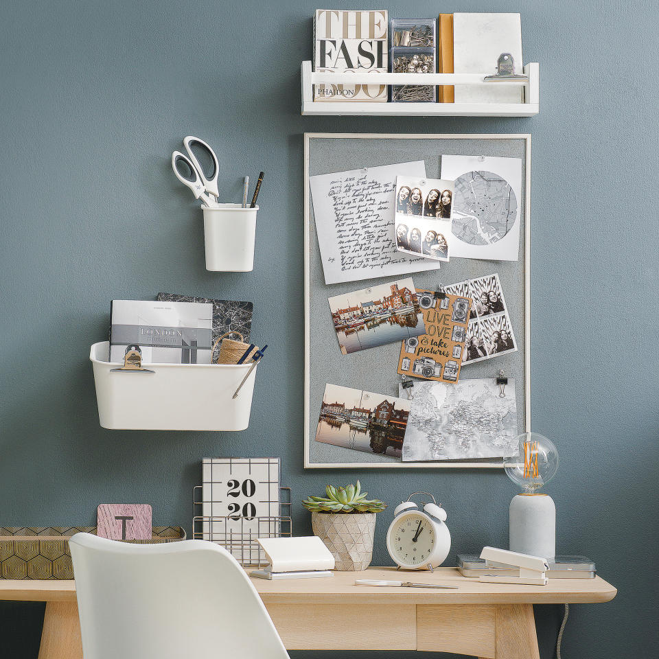 Blue home office with wall mounted storage