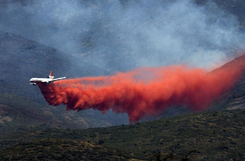 Wildfires rage in Western states