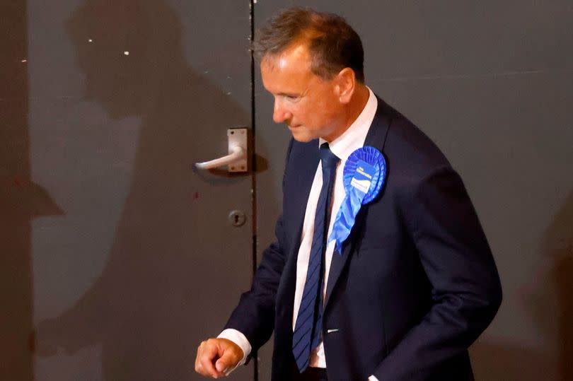 Alun Cairns leaves the Vale of Glamorgan count after losing his seat at the General Election 2024