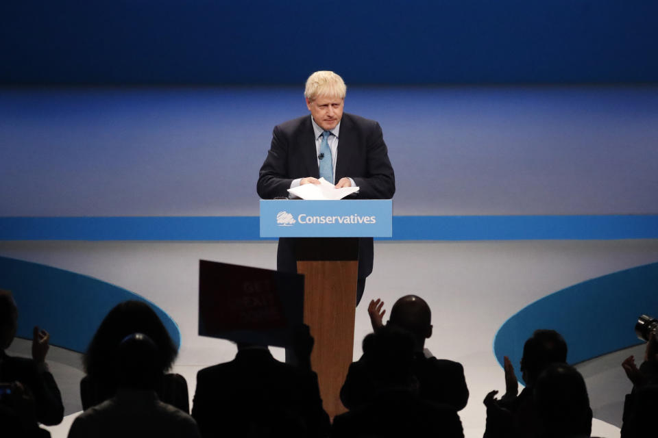 The audience applauds as Britain's Prime Minister Boris Johnson finishes his Leader's speech at the Conservative Party Conference in Manchester, England, Wednesday, Oct. 2, 2019. Britain's ruling Conservative Party is holding their annual party conference. (AP Photo/Frank Augstein)