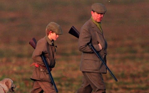 Prince Charles and a young Prince Harry out shooting at Sandringham - Credit: Bennett/Parker