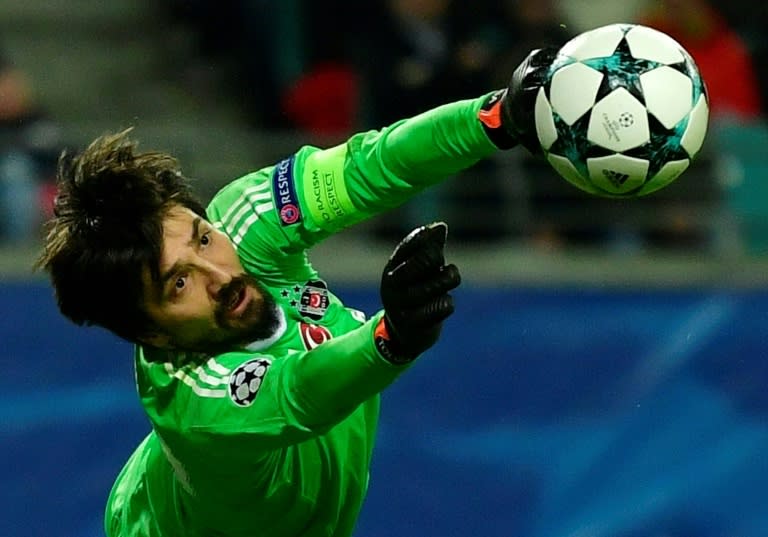 Besiktas' goalkeeper Tolga Zengin makes a save during their match against RB Leipzig in Leipzig, eastern Germany, on December 6, 2017