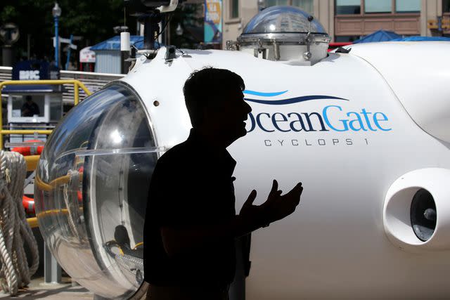 <p>David L. Ryan/The Boston Globe via Getty Images</p> Stockton Rush, OceanGate's CEO speaking at a press conference in June