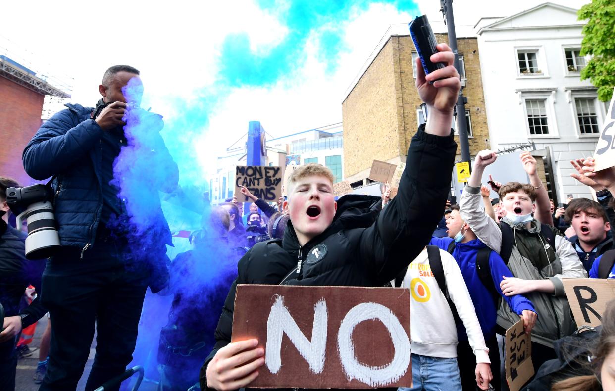 Chelsea fans outside Stamford Bridge protest against the club's involvement in the proposed European Super League (PA Wire)