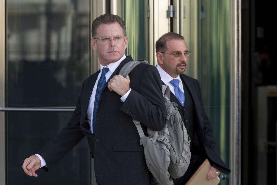 Douglas Haig, left, and his attorney Marc Victor leave the Lloyd George Federal Courthouse, Tuesday Nov. 19, 2019, in Las Vegas, after pleading guilty to illegally manufacturing tracer and armor-piercing bullets found in a high-rise hotel suite where a gunman took aim before the Las Vegas Strip massacre two years ago. Haig is a 57-year-old aerospace engineer who used to reload bullets at home in Mesa, Airz., and sell them at gun shows. He isn’t accused of a direct role in the Oct. 1, 2017, shooting that killed 58 people and injured hundreds at an open-air music festival.(Elizabeth Page Brumley/Las Vegas Review-Journal via AP)