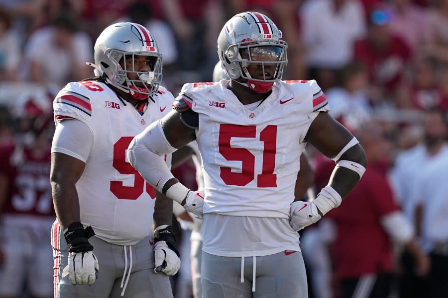 Ohio State defensive tackle Michael Hall Jr. (51) looks to the sidelines during the second half of an NCAA college football game against Indiana, Saturday, Sept. 2, 2023, in Bloomington, Ind. (AP Photo/Darron Cummings)