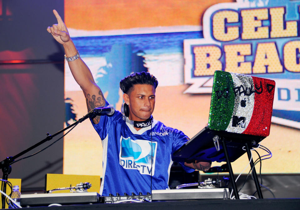 INDIANAPOLIS, IN - FEBRUARY 04: DJ Pauly D a.k.a. Paul DelVecchio performs during DIRECTV's Sixth Annual Celebrity Beach Bowl Game at Victory Field on February 4, 2012 in Indianapolis, Indiana. (Photo by Andrew H. Walker/Getty Images for DirecTV)