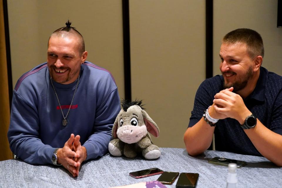 Oleksandr Usyk (left) and his promoter Alex Krassyuk (Nick Potts/PA) (PA Wire)