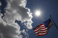 <p>An American flag flies outside of the FlagSource facility in Batavia, Illinois, U.S., on Tuesday, June 27, 2017. (Photo: Jim Young/Bloomberg via Getty Images) </p>