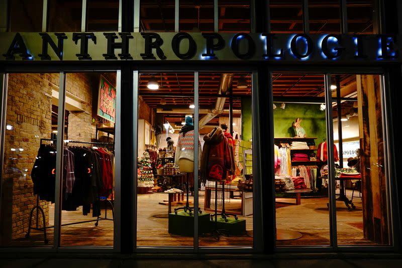 A closed Anthropologie women's clothing store is seen at night in Milwaukee's Historic Third Ward neighborhood