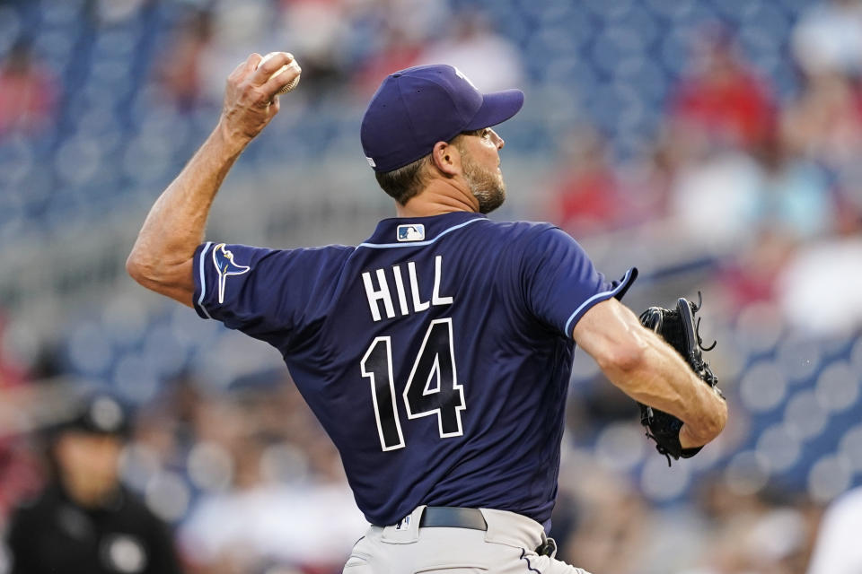 Tampa Bay Rays starting pitcher Rich Hill throws during the fourth inning of a baseball game against the Washington Nationals at Nationals Park, Tuesday, June 29, 2021, in Washington. (AP Photo/Alex Brandon)