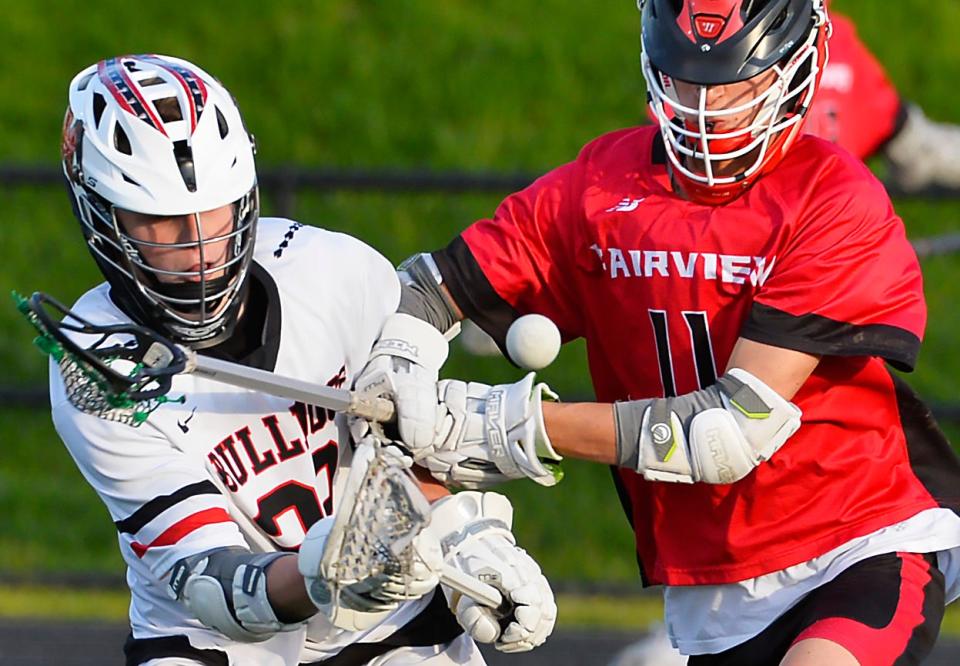 Meadville Area Senior High School senior Dennis Frantz, left, and Fairview senior Logan Milie compete during a PIAA Class 2A semifinal lacrosse game at Dollinger Field, Hagerty Family Events Center in Erie on May 19, 2022.