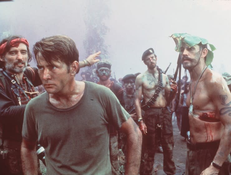 Capt. Willard (Martin Sheen) warily surveys a temple compound in "Apocalypse Now."