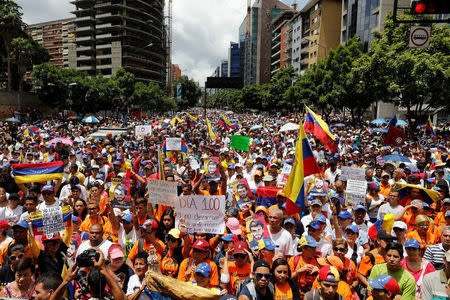 Opposition supporters attend a rally against Venezuelan President Maduro's government in Caracas. REUTERS/Andres Martinez Casares