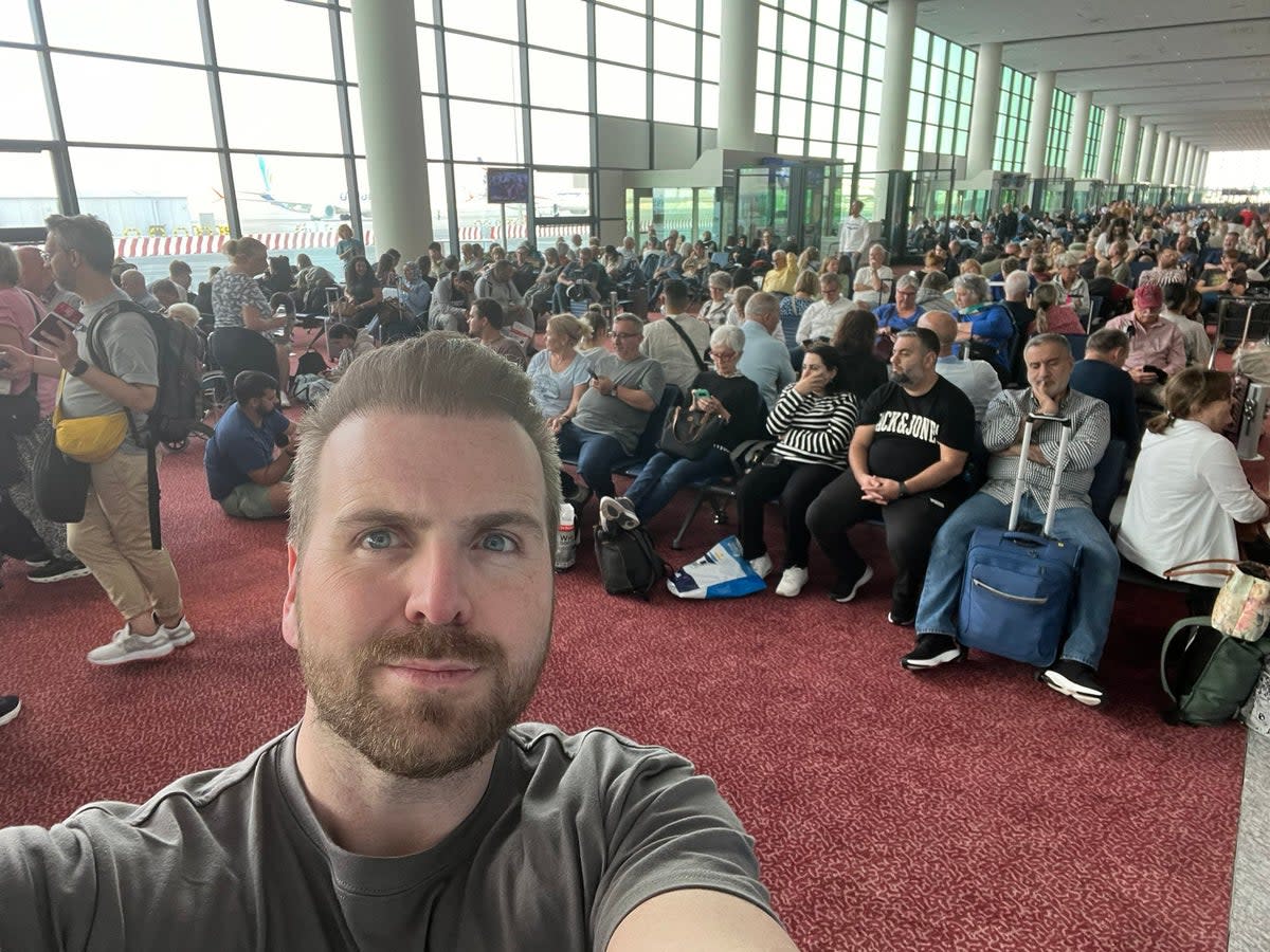 Englishman Paul Lidwith waiting at Dubai World Central Airport after his stopover at Dubai International Airport was diverted due to flooding on Wednesday (Paul Lidwith/PA Wire)