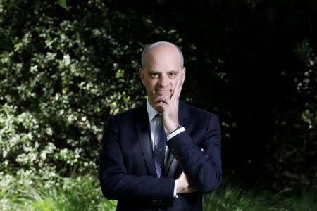 French Education Minister Jean-Michel Blanquer poses in the garden of the Education Ministry in Paris, France, June 19, 2018. REUTERS/Benoit Tessier/Files