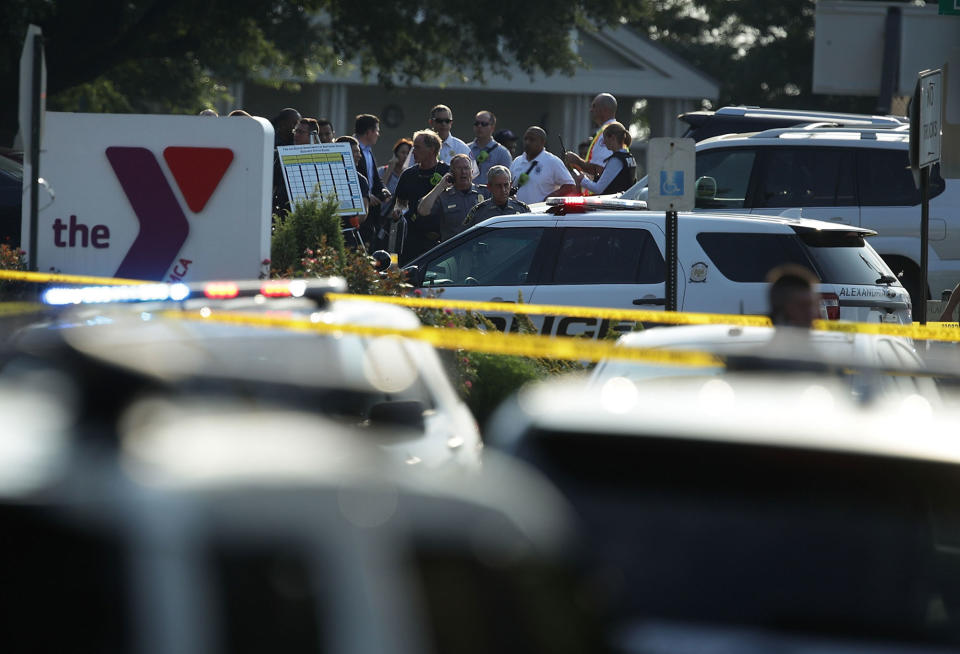 <p>Investigators gather near the scene of an opened fire June 14, 2017 in Alexandria, Virginia. Multiple injuries were reported from the instance. (Photo: Alex Wong/Getty Images) </p>