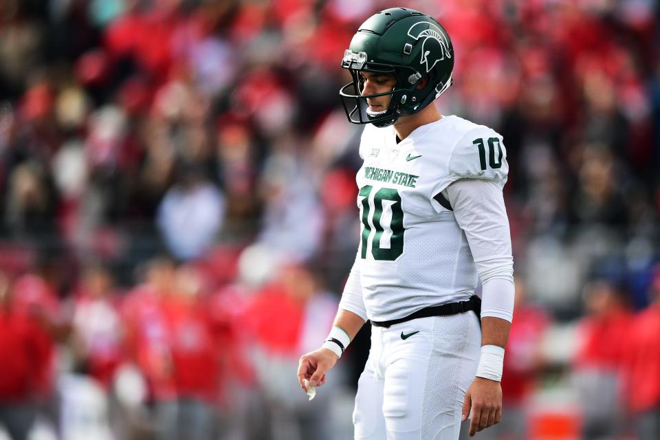 Payton Thorne of the Michigan State Spartans reacts as he walks off the field after throwing an incomplete pass for a fourth down during the first half of a game against the Ohio State Buckeyes at Ohio Stadium on Nov. 20, 2021 in Columbus, Ohio.