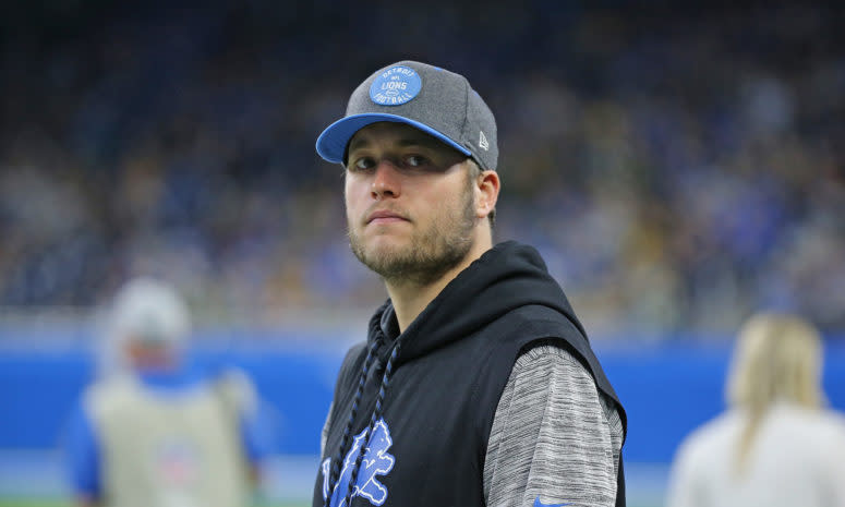 Matthew Stafford looks onto the field during a game.