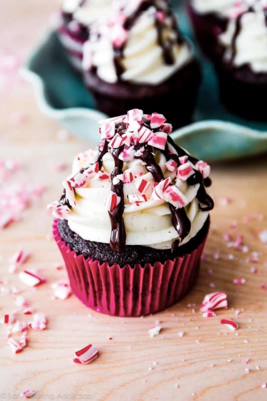 <p>Sally's Baking Addiction</p><p>Deep chocolate cupcakes flavored with peppermint and coffee, topped with peppermint vanilla frosting, candy canes, and a chocolate drizzle.</p><p><strong>Get the recipe: <a href="https://sallysbakingaddiction.com/peppermint-mocha-cupcakes/?utm_term=cupcakes&utm_campaign=8728075762" rel="nofollow noopener" target="_blank" data-ylk="slk:Peppermint Mocha Cupcakes;elm:context_link;itc:0;sec:content-canvas" class="link ">Peppermint Mocha Cupcakes</a></strong></p>