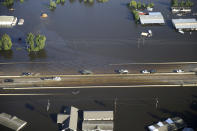 <p>Vehicles drive on Interstate 10 which was flooded from Tropical Storm Harvey in Vidor, Texas, Thursday, Aug. 31, 2017. (Photo: Gerald Herbert/AP) </p>