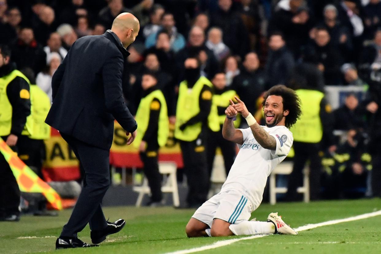 Marcelo celebrates his goal – Real Madrid’s third – against PSG on Wednesday at the Santiago Bernabeu. (Getty)