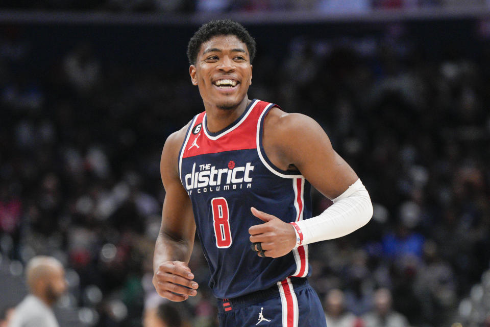 Washington Wizards forward Rui Hachimura (8) smiles after scoring against the Orlando Magic during the second half of an NBA basketball game, Saturday, Jan. 21, 2023, in Washington. (AP Photo/Jess Rapfogel)