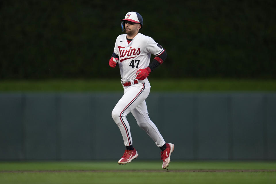 Minnesota Twins' Edouard Julien runs the bases on a solo home run against the Oakland Athletics during the first inning of a baseball game Wednesday, Sept. 27, 2023, in Minneapolis. (AP Photo/Abbie Parr)