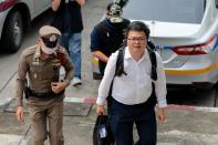 Anon Nampa, a pro-democracy student, one of the leaders of Thailand's recent anti-government protests, is pictured after being arrested, at the police station in Bangkok