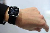 Sony SmartWatch conected to a Sony mobile phone during a presentation at the Mobile World Congress. AFP PHOTO/LLUIS GENE