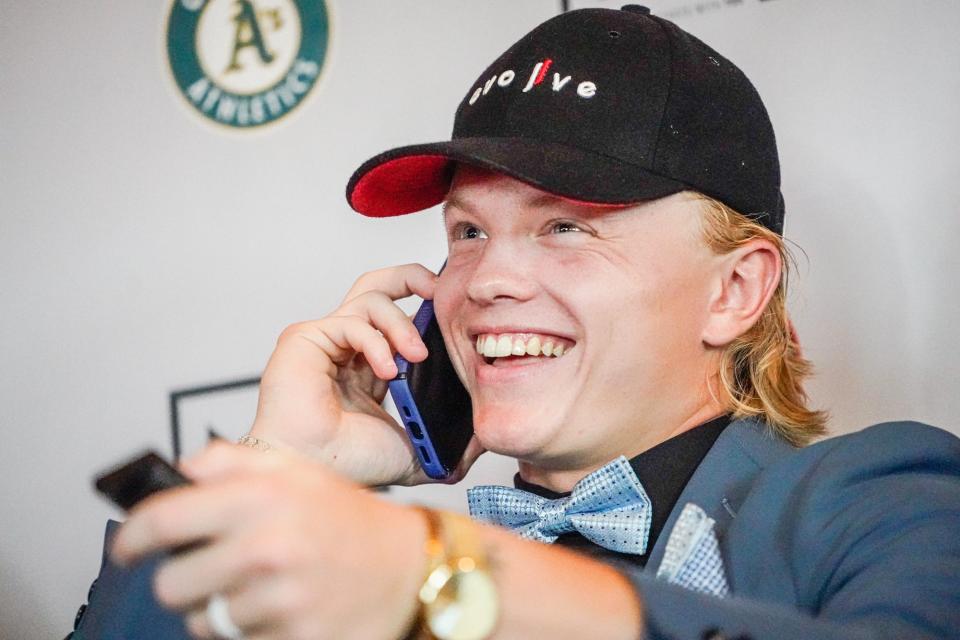Franklin Community High School's baseball star Max Clark gets the call that he has been drafted by the Detroit Tigers during the MLB draft on Sunday, July, 9, 2023, at his family home in Franklin Ind.