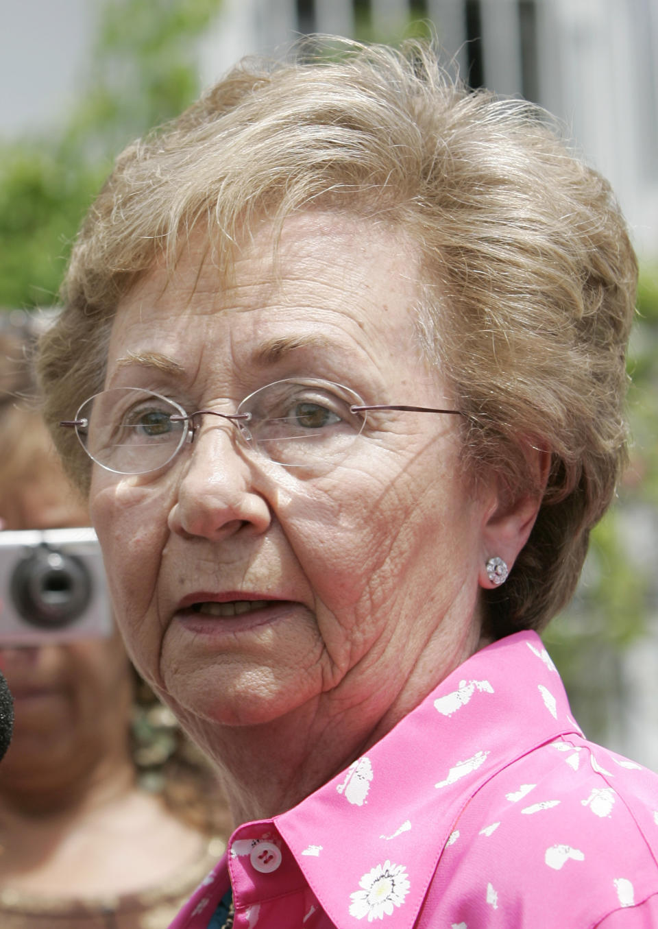 FILE - Juanita Castro, the sister of Cuban leader Fidel Castro, talks to reporters about her brother, Aug. 3, 2006, in Miami. Juanita Castro, the anti-communist sister of Cuban rulers Fidel and Raul Castro who worked with the CIA against their government, has died in Miami at age 90. Journalist María Antonieta Collins, who co-wrote Juanita Castro’s 2009 book, “Fidel and Raúl, My Brothers. The Secret History," wrote on Instagram that she died on Monday, Dec. 4, 2023. (AP Photo/Alan Diaz, File)