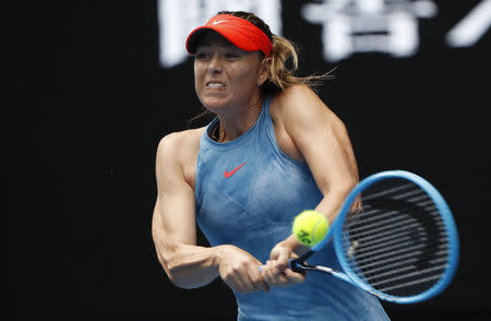 Tennis - Australian Open - Third Round - Melbourne Park, Melbourne, Australia, January 18, 2019. Russia's Maria Sharapova in action during the match against Denmark's Caroline Wozniacki. REUTERS/Aly Song