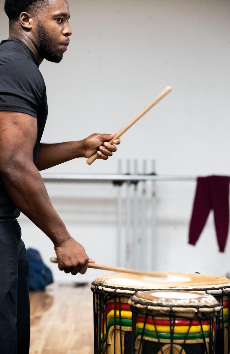 Dancers groove to live percussion music as the Ayoka Afrikan Drum and Dance Incorporation rehearses on Monday, Feb. 6, 2023 in Tallahassee, Fla. 