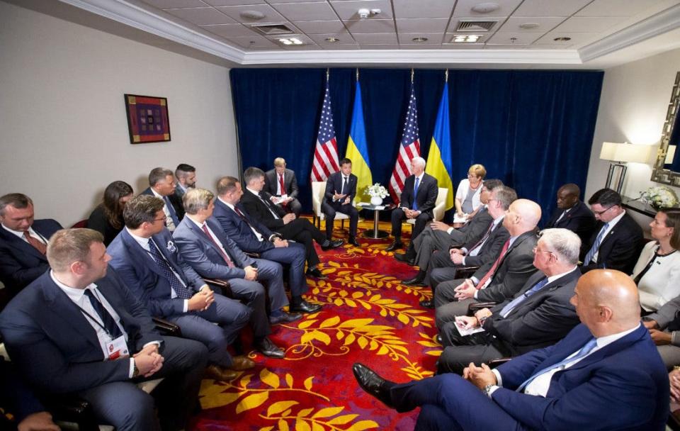 This handout picture taken and released by Ukrainian presidential press-service on September 1, 2019, shows Vice President Mike Pence and Ukrainian President Volodymyr Zelensky holding talks next to their delegations in Warsaw.