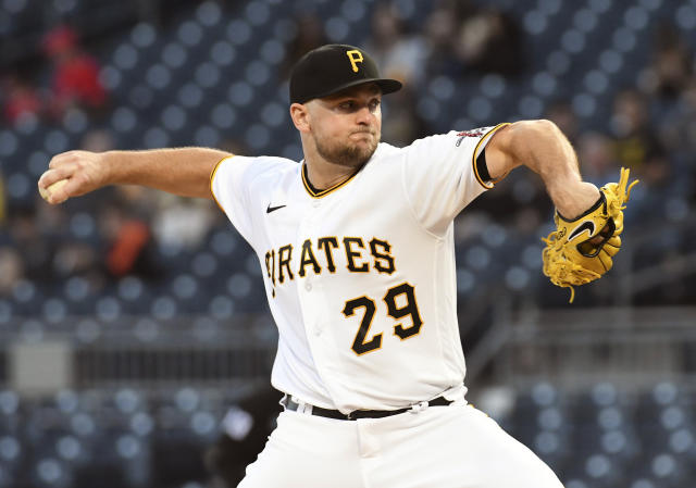 Tucker makes great grab, hits grand slam, Pirates beat Reds - The