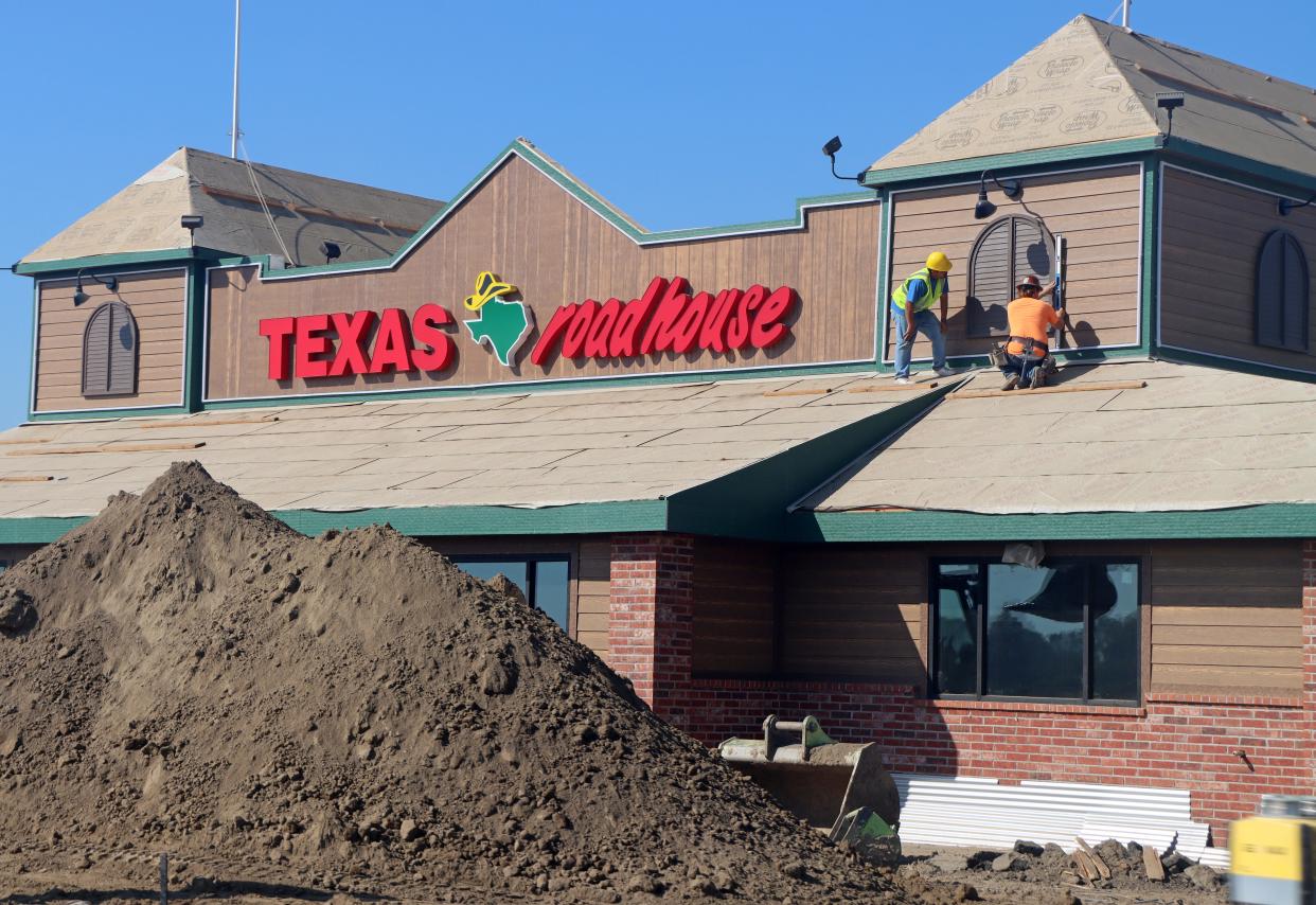 Construction on the Texas Roadhouse off of South Mooney Boulevard continues through September. The restaurant should open sometime in December.