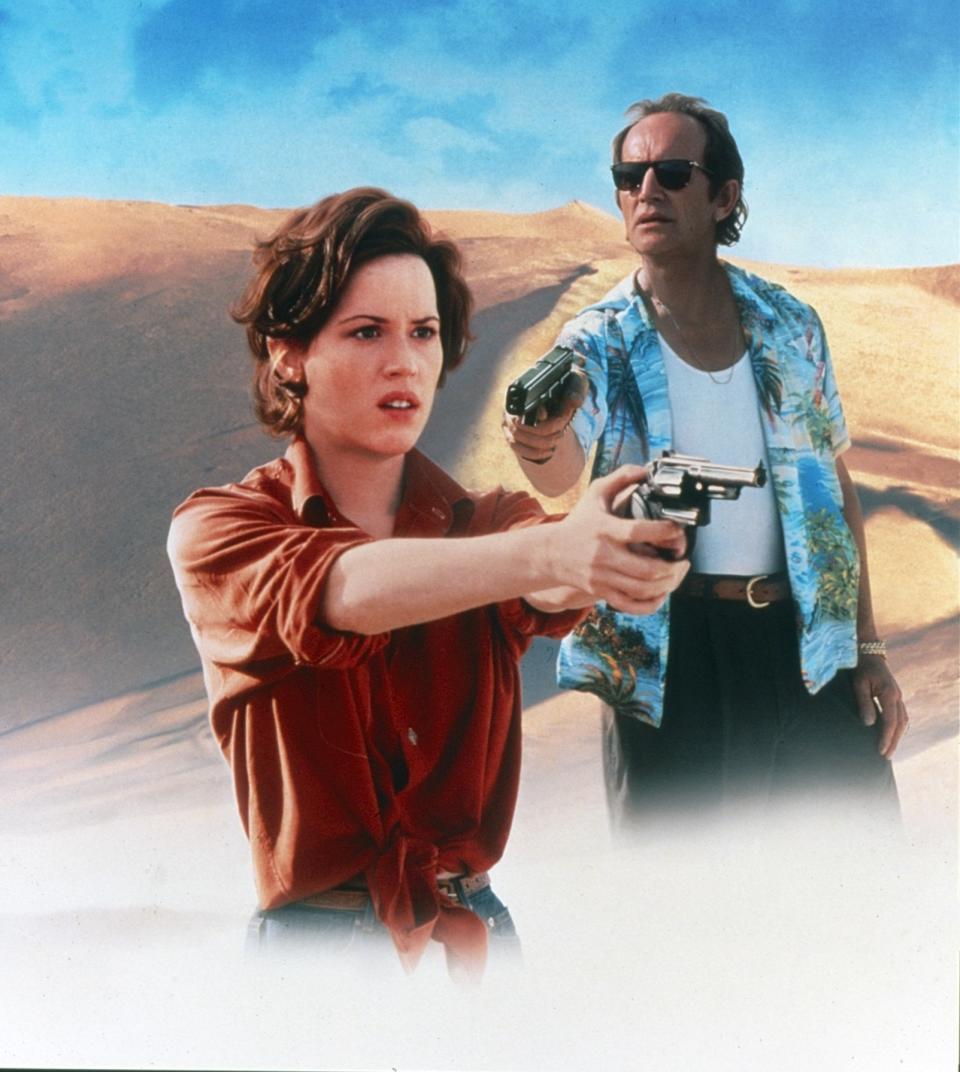 BAJA, (aka BAD GUYS), from left: Molly Ringwald, Lance Henriksen, 1995. © Republic Pictures /Courtesy Everett Collection, knotted shirts, 90s fashion style trends