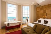 <p>For a soak with a sea view, book a stay at <a href="https://www.booking.com/hotel/gb/drakes.en-gb.html?aid=2200769&label=hotel-room-bath-tub" rel="nofollow noopener" target="_blank" data-ylk="slk:Drakes;elm:context_link;itc:0;sec:content-canvas" class="link ">Drakes</a> in Brighton, one of the UK’s original boutique hotels and still the proud owner of a celebrity following today (among the rumoured guests are Kylie Minogue and Cate Blanchett). The hotel is set across two Georgian townhouses, with wood panelling, cornicing and art deco accents. <br><br>If a freestanding bath tub in the bedroom is a dealbreaker, book a King Room with Sea View and watch the swooping seagulls outside as you unwind.<br></p><p><a class="link " href="https://www.booking.com/hotel/gb/drakes.en-gb.html?aid=2200769&label=hotel-room-bath-tub" rel="nofollow noopener" target="_blank" data-ylk="slk:CHECK AVAILABILITY;elm:context_link;itc:0;sec:content-canvas">CHECK AVAILABILITY</a></p>