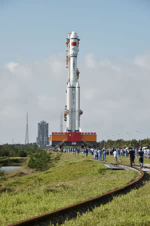 Long March-7 rocket and Tianzhou-1 cargo spacecraft are seen as they are transferred to a launching spot in Wenchang, Hainan province, China, April 17, 2017. China Daily/via REUTERS