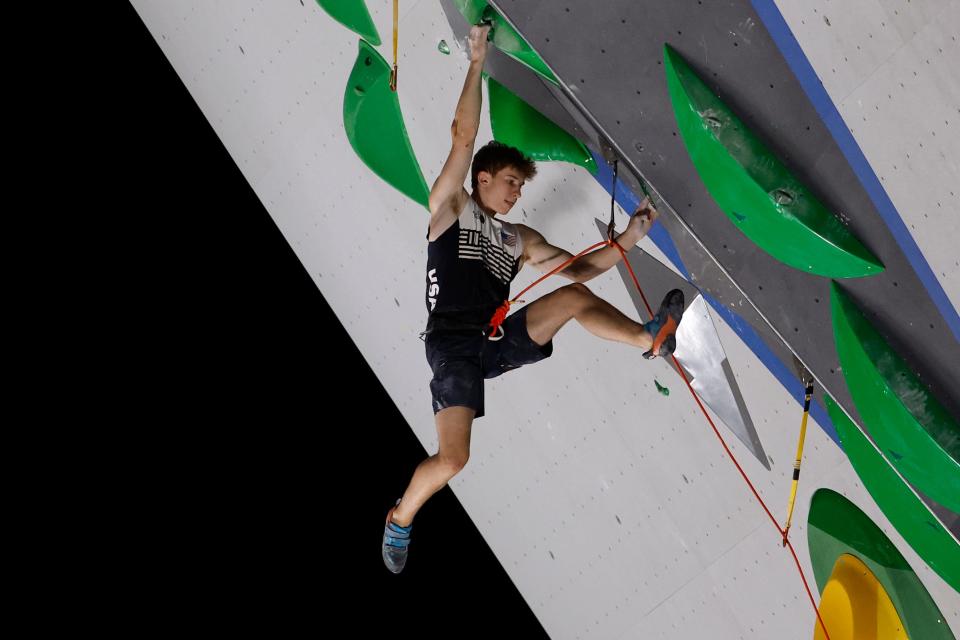 Colin Duffy of the United States competes in lead qualification of sport climbing.