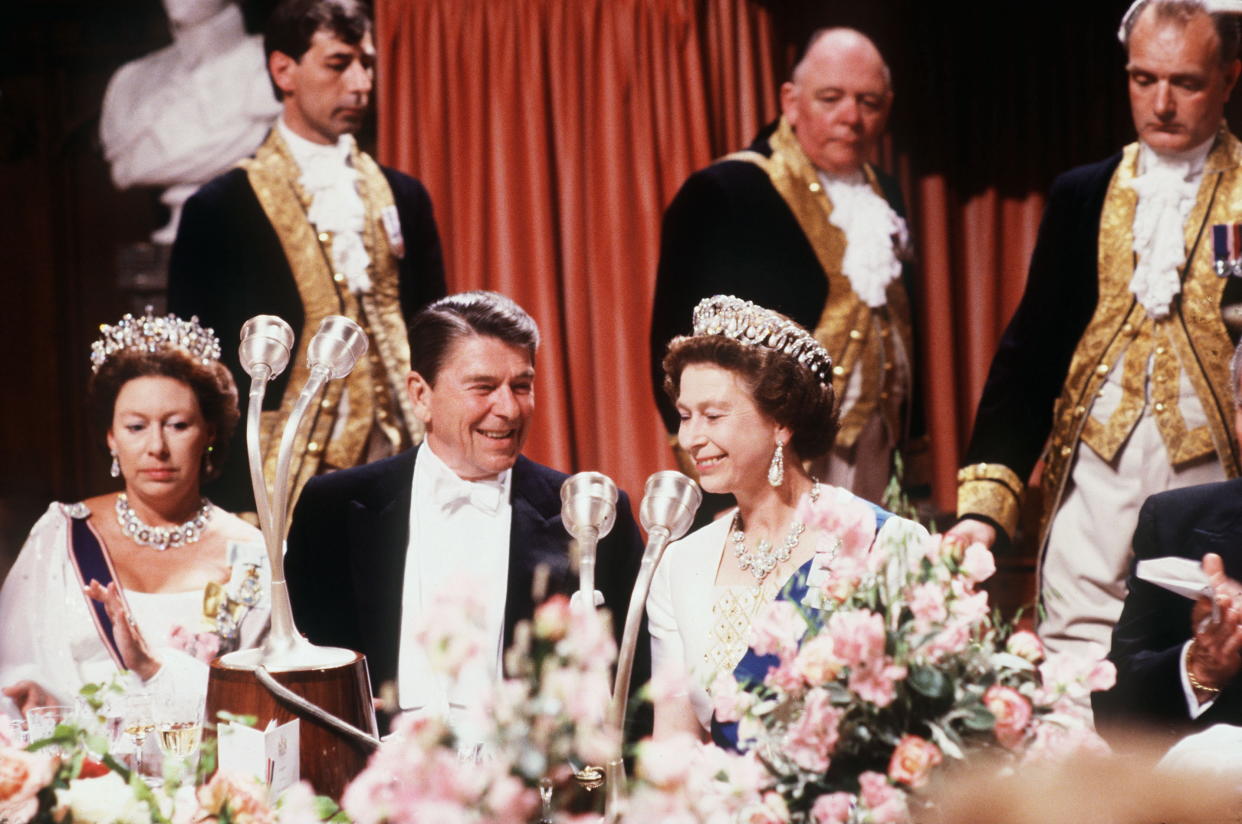 WINDSOR, UNITED KINGDOM - JUNE 07:  The Queen Sharing A Joke With President Ronald Reagan During A Banquet At Windsor Castle.  (Photo by Tim Graham Photo Library via Getty Images)