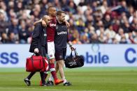<p>West Ham United’s Winston Reid goes off injured </p>