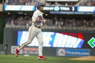 Minnesota Twins' Luis Arraez rounds the bases after hitting a three-run homer against the Cleveland Guardians in the seventh inning of a baseball game Tuesday, June 21, 2022, in Minneapolis. (AP Photo/Andy Clayton-King)
