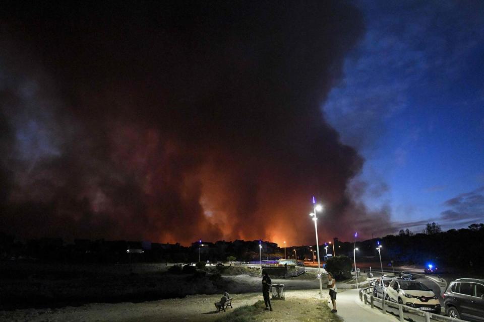 A column of smoke amid fires in Sausset-les-Pins, near Marseille (AFP via Getty Images)