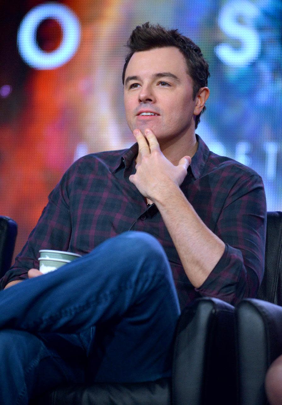 Executive producer Seth MacFarlane speaks during the panel for "Cosmos" at the FOX Winter 2014 TCA, on Monday, Jan. 13, 2014, at the Langham Hotel in Pasadena, Calif. (Photo by Richard Shotwell/Invision/AP)