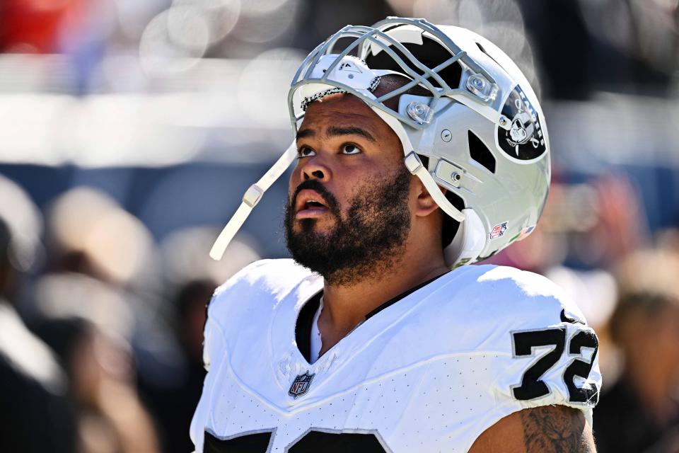 Oct 22, 2023; Chicago, Illinois, USA; Las Vegas Raiders guard Jermaine Eluemunor (72) heads to the locker room after warming up before a game against the Chicago Bears at Soldier Field. Mandatory Credit: Jamie Sabau-USA TODAY Sports