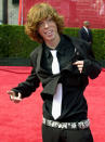 <p>Snowboarder Shaun White shows off his belt as he arrives at the 11th annual ESPY Awards, Wednesday, July 16, 2003, in Los Angeles. The ESPY Awards honor the year’s top performances and sports moments. White is nominated for best action sports athlete. (AP Photo/Jerome T. Nakagawa) </p>